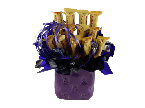 9-purple-tufter-toblerone-cleaned-web